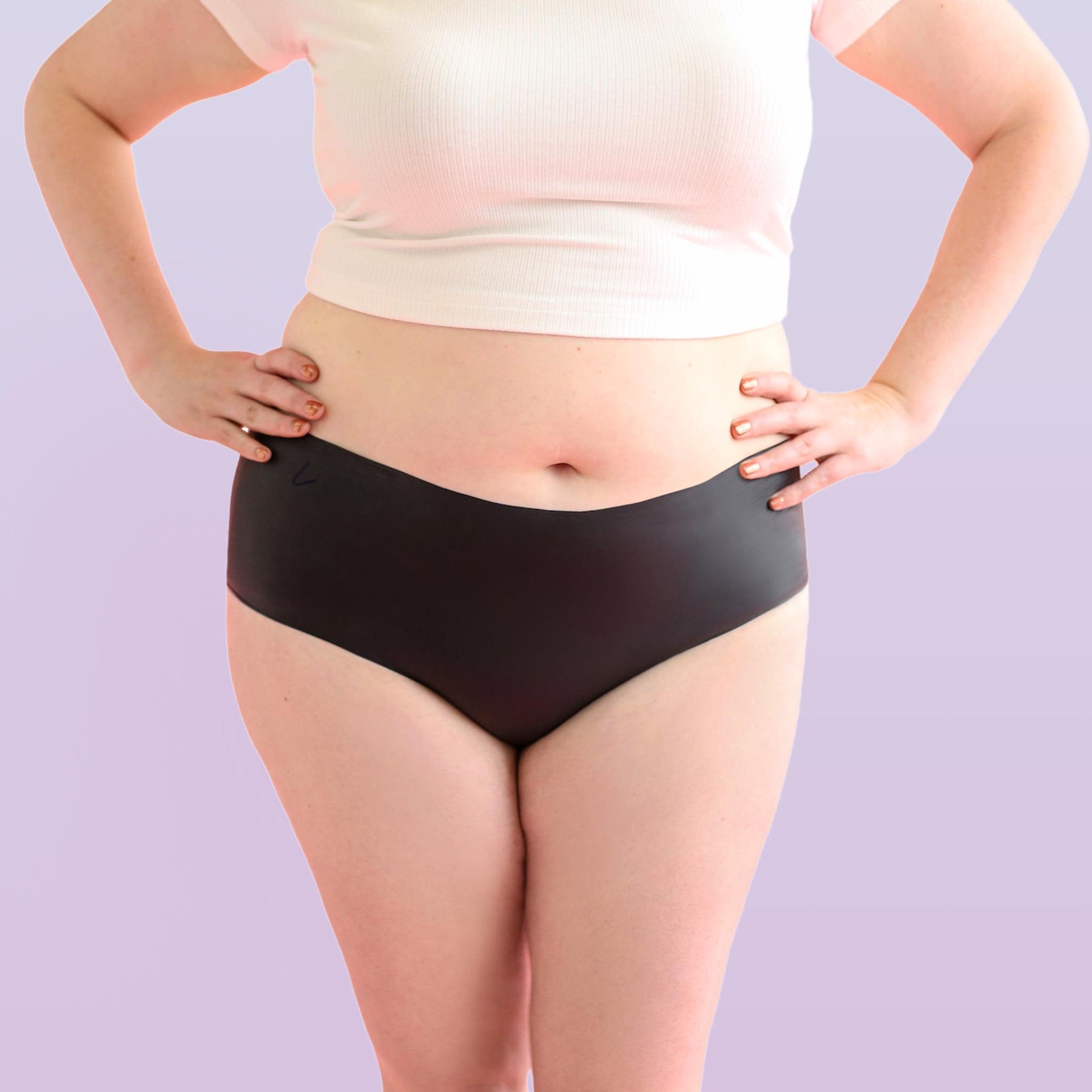 Lorals model Amanda demonstrates the front view of STI Protection Undies in Black Shorties