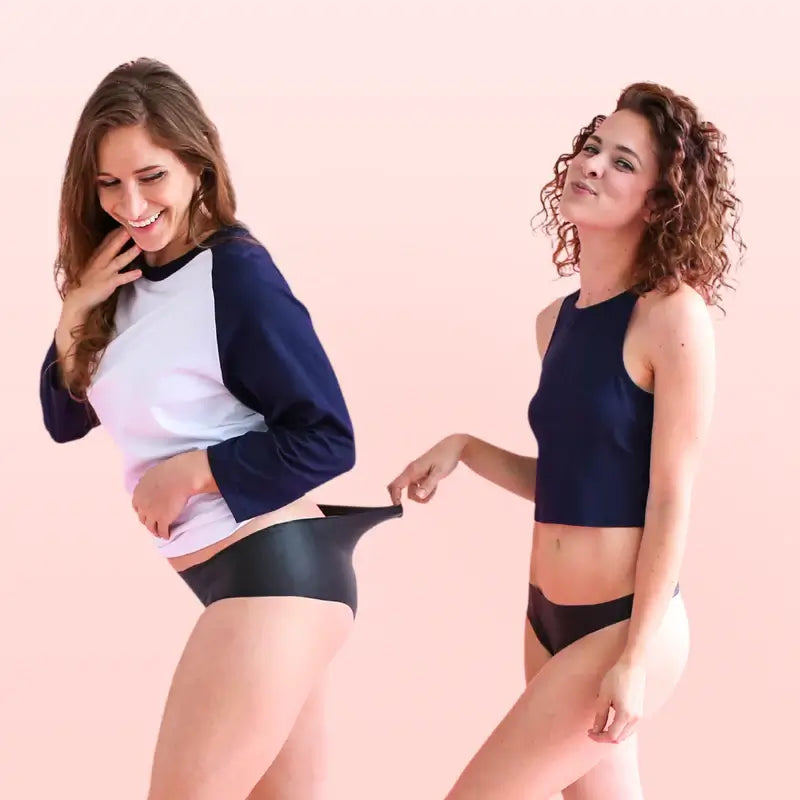 People modeling Lorals for Pleasure — sleek, ultra-thin latex underwear designed for oral sex, including cunnilingus and analingus.