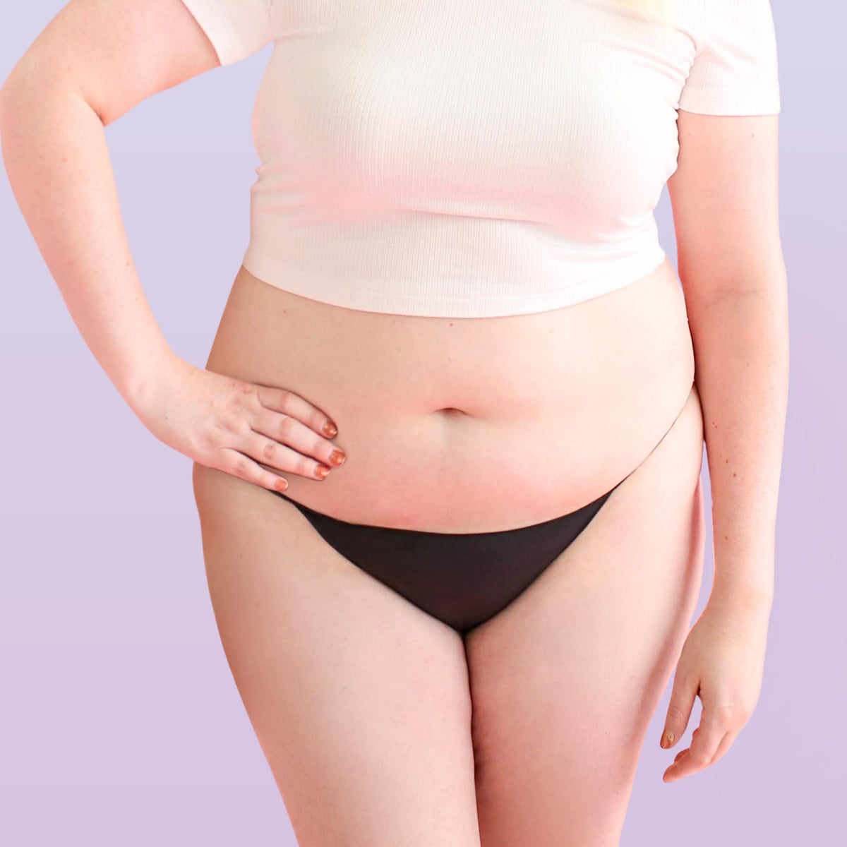 Lorals model Amanda demonstrates the front view of STI Protection Undies in Black Bikinis